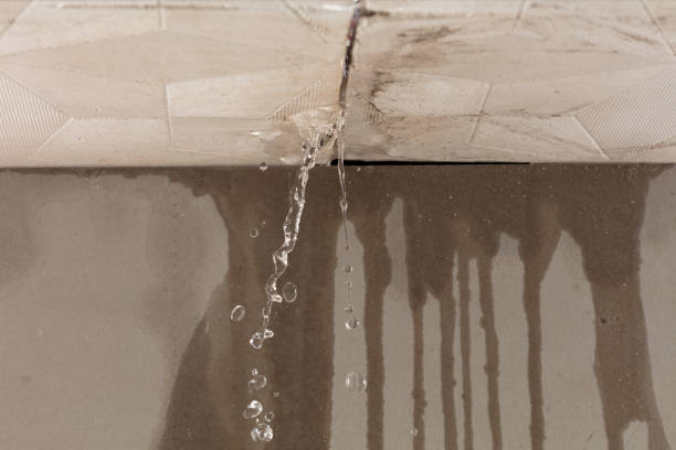 Professional Flood Damage Cleanup technician working in Old Town, ME